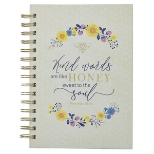 May include: A spiral-bound notebook with a floral design and the text "Kind words are like honey sweet to the soul." The cover features a bee illustration and a honeycomb pattern. The floral design includes yellow, blue, and pink flowers.