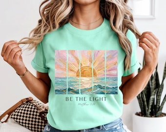 Christian Faith Shirt – Matthew 5:14 "Be The Light" Sunrise Beach Tee
