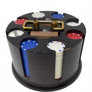 May include: A dark brown wooden carousel poker chip holder with a gold-toned metal handle on top. The holder contains stacks of blue, white, and red poker chips. One white chip is clearly marked with the word DEALER in black capital letters.