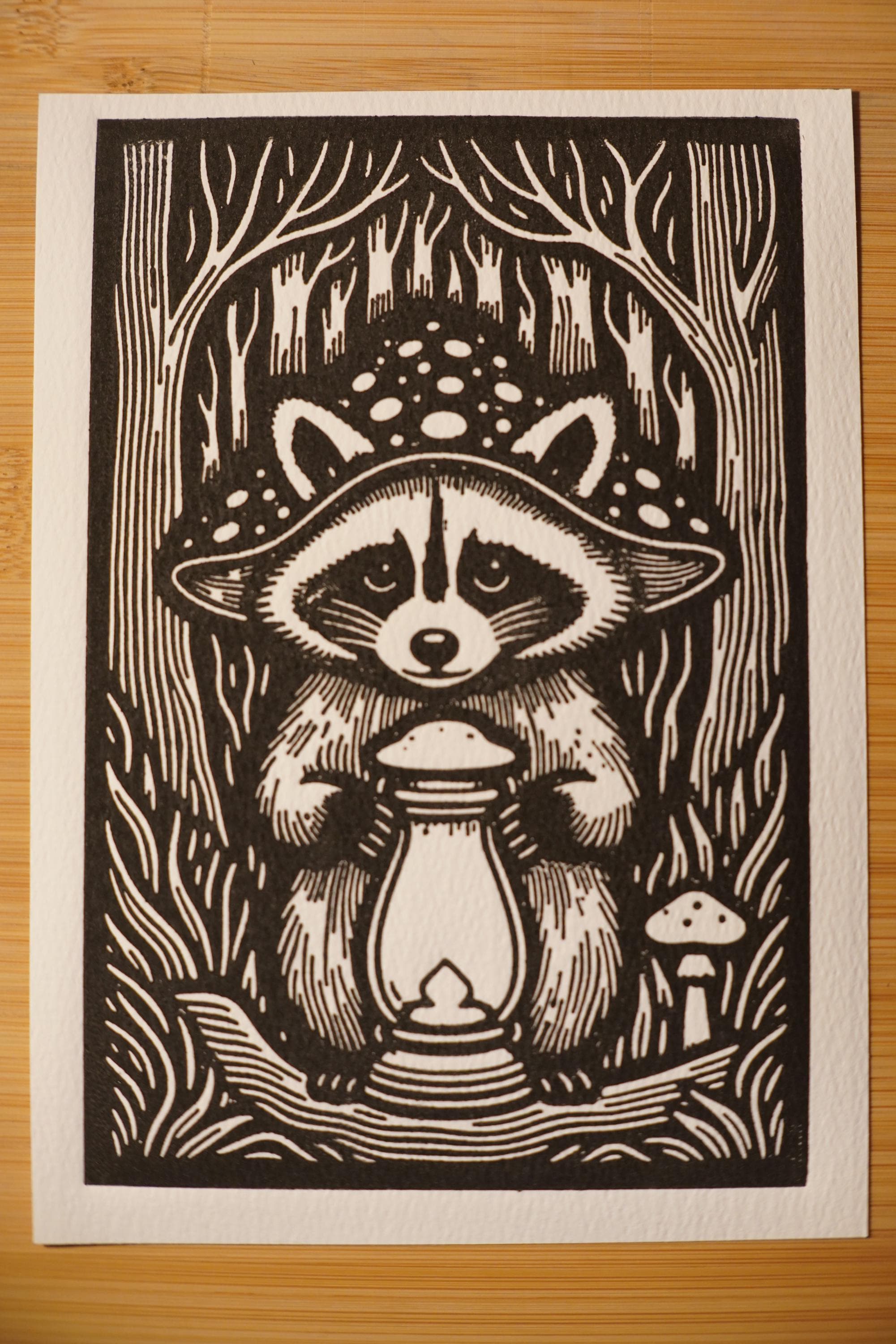 Close-up detail of handmade Raccoon Lantern Linocut Print linocut relief print showing carved texture