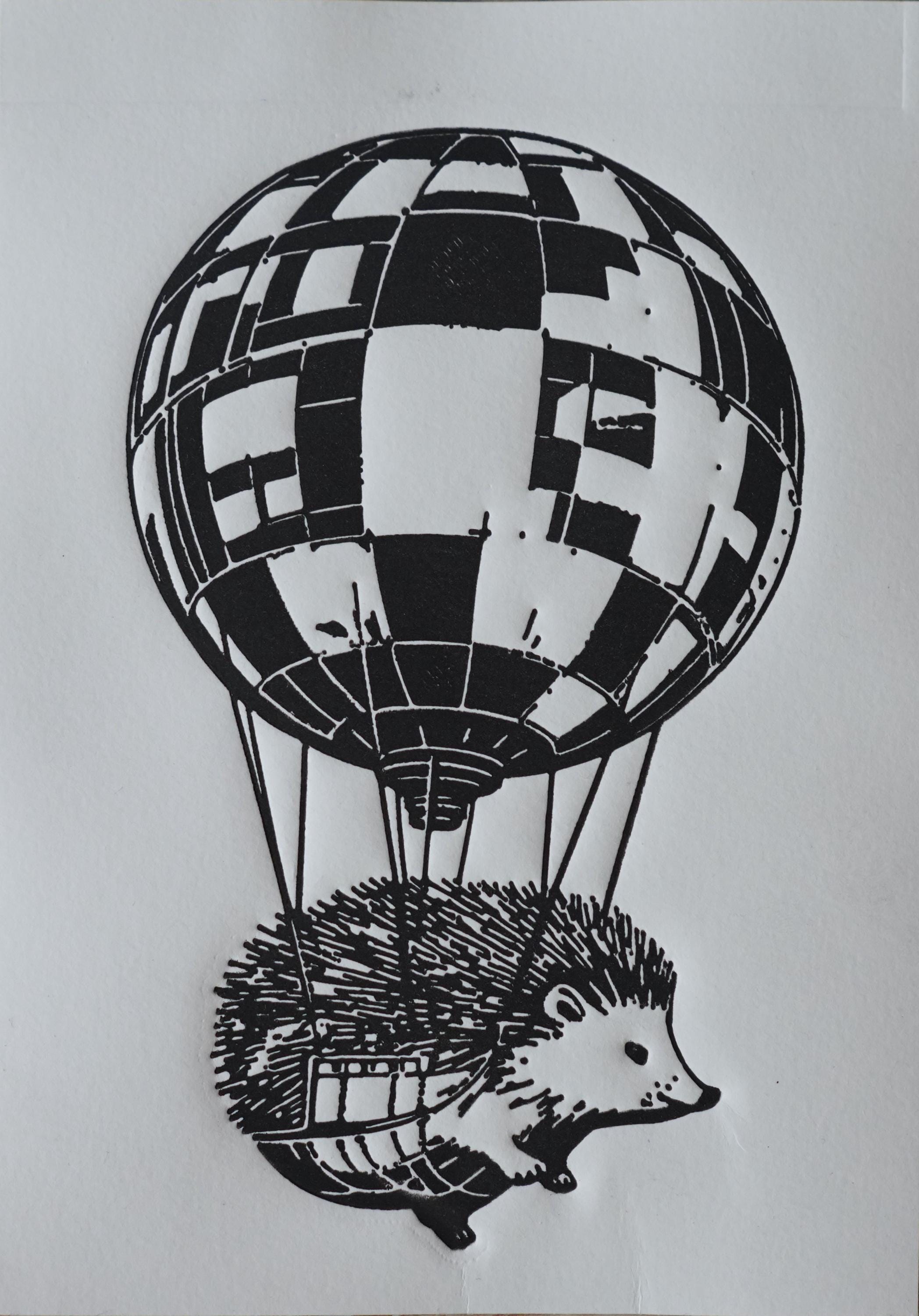 Hand-printed Hedgehog Hot Air Balloon Linocut Print A5 art print — black ink on white cotton paper