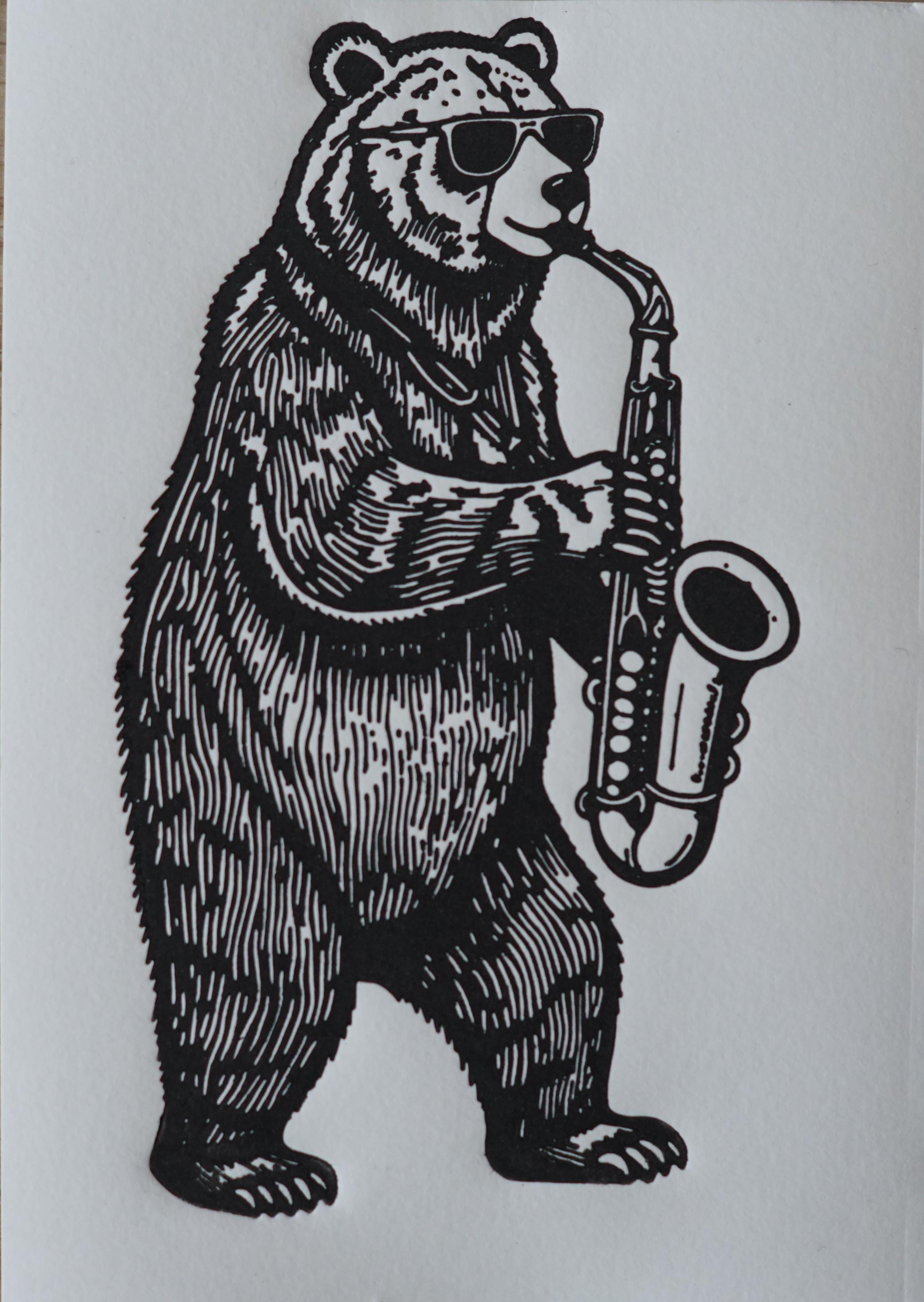 Close-up detail of handmade Jazz Bear Linocut Print linocut relief print showing carved texture