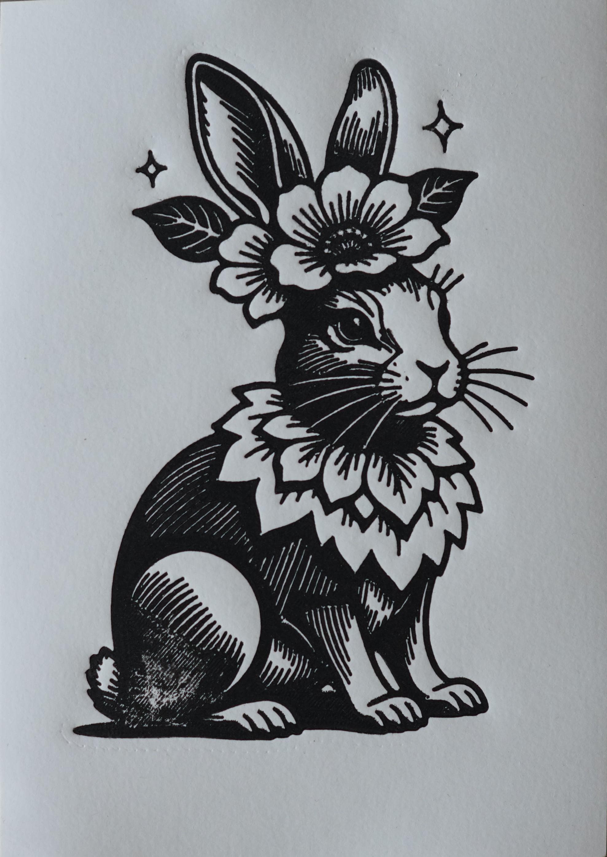 Close-up detail of handmade Floral Easter Bunny Linocut Print linocut relief print showing carved texture