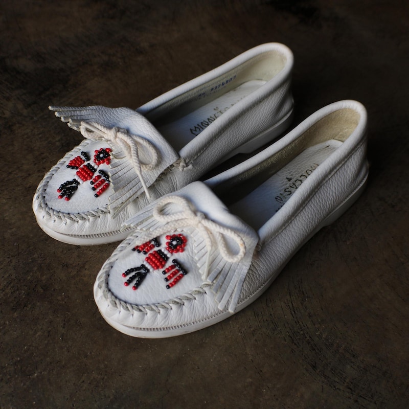 White eco leather women’s moccasin’s.
