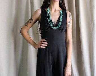 Mono de los años 70, jersey vintage negro de pierna ancha, talla pequeña sin mangas