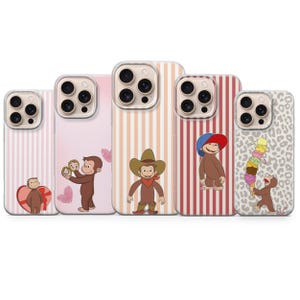 May include: Five phone cases featuring Curious George. Designs include striped patterns, hearts, and leopard print. Each case shows George in different outfits and poses. The cases are designed for various phone models.