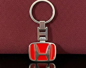 Llavero Honda: logotipo plateado en relieve, esmalte rojo
