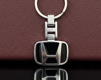 Llavero Honda: logotipo plateado en relieve, esmalte negro