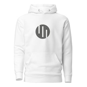 May include: A set of three ceramic mugs with a speckled, matte finish. The mugs are in shades of cream, light gray, and dark gray. Each mug has a simple, minimalist design and a rounded handle.