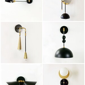 May include: Collection of modern wall sconces and pendant lights. Designs include black and gold finishes, geometric shapes, and dome shades. Each light fixture is mounted on a white wall, showcasing a variety of contemporary lighting options.
