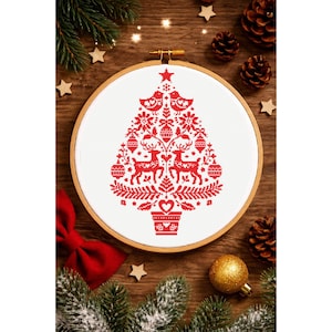 May include: A red and white cross-stitch Christmas tree design in a wooden embroidery hoop. The tree features reindeer, birds, and ornaments. The background includes pine cones, stars, and a red bow, creating a festive holiday theme.