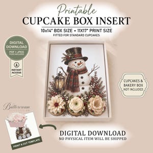 May include: A printable cupcake box insert featuring a snowman illustration with a top hat, plaid scarf, and lantern, surrounded by pine branches and three floral-topped cupcakes. Text includes Printable Cupcake Box Insert, 10x14 inch box size, 11x17 inch print size, and Digital Download.