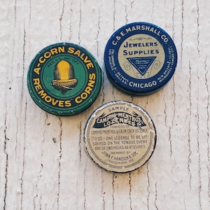 Vintage Mini tins, vintage, a-corn salve tin, tin container, box, cylinder tin, circular Marco, campho, acorn, vintage circle tins, jewelers