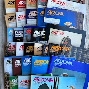 May include: A stack of vintage Arizona Highways magazines from 1975 to 1978. The covers feature colorful landscapes, Native American art, and scenic desert views.
