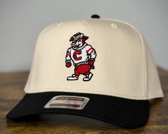 Bastones de la NHL con sombrero natural/negro de Otto, "Strutting Stormy" de los Carolina Hurricanes