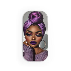 May include: A decorative tray featuring a digital illustration of a woman with dark skin wearing a purple turban and matching lipstick. The woman has gold hoop earrings and a purple sweater. The background is a light gray.