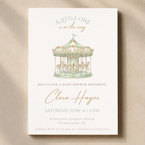 May include: Baby shower invitation with a carousel illustration in soft green and gold tones. The text reads "A Little One is on the way" and invites guests to a shower honoring Clara Hayes on June 11th at 3 PM in Charleston, SC. RSVP by June 5th.