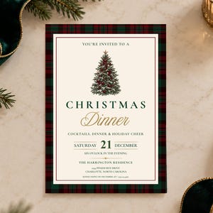 May include: A rectangular Christmas dinner invitation card with a red and green tartan border. The cream-coloured centre features a decorated Christmas tree illustration and text reading: YOU'RE INVITED TO A CHRISTMAS DINNER, COCKTAILS, DINNER & HOLIDAY CHEER, SATURDAY 21 DECEMBER, SIX O'CLOCK IN THE EVENING, THE HARRINGTON RESIDENCE, 1234 PINEHURST DRIVE, CHARLOTTE, NORTH CAROLINA, KINDLY REPLY BY DECEMBER 05 | 704.555.0199.