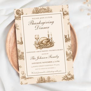 May include: A rectangular Thanksgiving dinner invitation card featuring a cream background with brown toile-style illustrations of turkeys, pumpkins, and landscapes. The text reads: Please join us for Thanksgiving Dinner, The Johnson Family, November 21.
