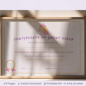 May include: A framed certificate with the text "CERTIFICATE OF GREAT SLEEP" in purple. It features a cartoon illustration of a sleeping child and is designed to encourage healthy sleep habits. The certificate is in a wooden frame.