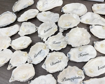 Plaatsnaamkaartjes oesterschelp met maaltijdidentificatie (A/B) – gepersonaliseerde naamkaartjes voor bruiloften