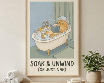May include: A framed print featuring a cartoon cat relaxing in a bathtub filled with bubbles. The orange tabby cat wears a shower cap and reads a book titled "Nap Time Stories." The print includes the text "SOAK & UNWIND (OR JUST NAP)."
