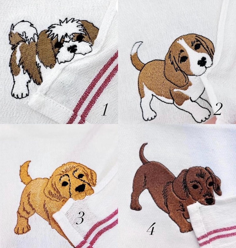 May include: Four white kitchen towels featuring embroidered dog designs. Towel 1 shows a brown and white Shih Tzu, towel 2 a brown and white Beagle, towel 3 a golden retriever puppy, and towel 4 a solid brown dachshund. Each towel has red stripes.