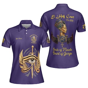 May include: Purple polo shirt with gold and white graphics. The front features an eye and sword design, with the text "Your Name" and "Imperial Court Daughters." The back displays a bust of a woman, wings, and the text "El Hajj Court No. 252" and "Oasis of Musella Desert of Georgia."
