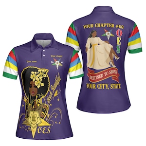 May include: Purple polo shirt with a graphic of a woman with a floral afro, gold accents, and the text "Black Beautiful." The back features a woman in a white dress, the text "Your Chapter #68," and "Destined to Shine."