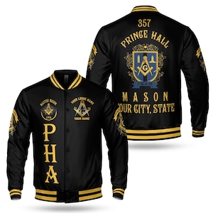 May include: Black and gold varsity jacket with Masonic emblems and text. The front features "MASTER MASON" and "PHA" in gold. The back displays "357 PRINCE HALL" and "MASON YOUR CITY, STATE".