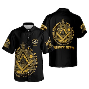 May include: Black button-down shirt with short sleeves, featuring gold Masonic symbols and text. The design includes a triangle with an eye, compass, and square, along with the phrases "From Darkness To Light" and "As Above, So Below."