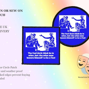 May include: Blue iron-on or sew-on patches featuring a white illustration of two figures and the quote "The fool doth think he is wise, but the wise man knows himself to be a fool." One patch is square, the other circular.