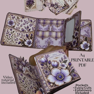 Peut inclure: Un folio en papier avec des motifs floraux violets et blancs, comprenant des poches, un petit miroir et des éléments décoratifs. La couverture affiche le texte Where violets remember, avec la mention A4 PRINTABLE PDF.