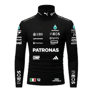May include: A black long-sleeve mock neck shirt featuring various white sponsor logos including Petronas, Ineos, UBS, and Crowdstrike. The shirt displays the name Kimi Antonelli, the number 12, and an Italian flag graphic on the lower front section.