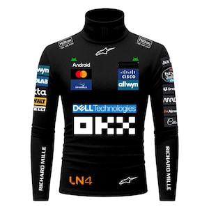 May include: Black long-sleeved turtleneck shirt with various sponsor logos, including "Android," "Cisco," and "Dell Technologies." The shirt also features the text "RICHARD MILLE" on the sleeves and the number "LN4" on the front.