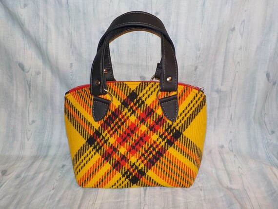 Rebecca's of Clinton - Tartan Plaid Handbags Available in Tan, Black and  Red Trim Large $60 Medium $50 Wristlet $40 | Facebook