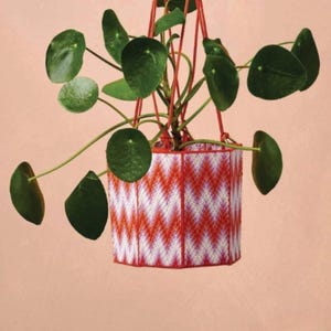 May include: A set of three ceramic mugs with a speckled, matte finish. The mugs are in shades of cream, light gray, and dark gray. Each mug has a simple, minimalist design and a rounded handle.