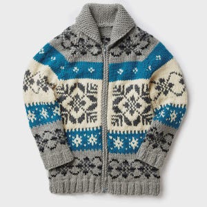 May include: A gray, blue, and cream-colored zip-up sweater with a shawl collar. The sweater features a geometric pattern in gray, cream, and blue. The cuffs and bottom hem are gray.