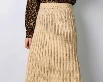 Patrón de falda midi de corte A a crochet con canalé vertical. Tutorial en PDF digital.