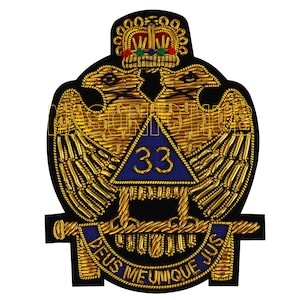 May include: Embroidered patch featuring a double-headed eagle design with a crown. The patch has gold thread detailing on a black background, with a blue triangle containing the number 33. The text "DEUS MEUMQUE JUS" is also present.