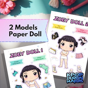 May include: Two paper doll sheets featuring the text "2 Models Paper Doll" and "Zoey Doll 1" and "Zoey Doll 2". Each sheet has a cartoon doll with various outfits labeled "Casual K Pop Outfit", "Urban K Pop Outfit", and "Idol Stage Outfit".