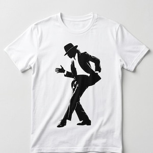 May include: White t-shirt with a black silhouette of a person in a suit and fedora, captured mid-dance. The graphic is a stylized representation of a famous performer. The shirt is made of a soft, comfortable material.