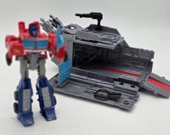 Transformers EarthSpark Optimus Prime Battle Base Trailer Playset / Figura de acción Hasbro Juguete / Regalo / Diversión