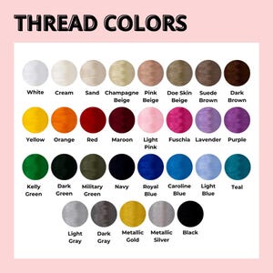 May include: A colour chart displaying thread colours with the text "THREAD COLORS" at the top. The chart includes a variety of colours such as white, cream, yellow, orange, red, maroon, pink, purple, green, blue, and metallic gold and silver.