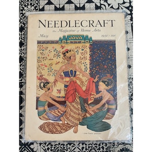 May include: A vintage May 1931 issue of Needlecraft The Magazine of Home Arts featuring the text JAVA. The cover illustration depicts three figures in traditional attire with ornate headpieces, set against a floral and patterned background.