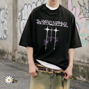 Loose Graphic Shirt | Oversized Short Sleeve Top | Daily Wear | Y2K Streetwear Style

Oversized graphic T-shirt with front and back prints, loose fit design, and Y2K streetwear style for casual everyday wear.