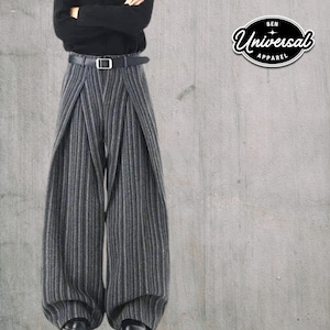 May include: Wide-leg, vertically striped gray pants with a black belt. The pants have a unique design with a split front. The logo "BEN UNIVERSAL APPAREL" is visible in the upper right corner.