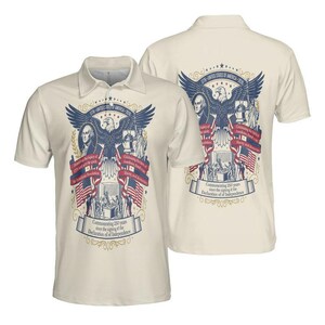 May include: Cream-coloured polo shirt with a patriotic design. The front and back feature an eagle, flags, and historical figures, commemorating the 250th anniversary of the Declaration of Independence.