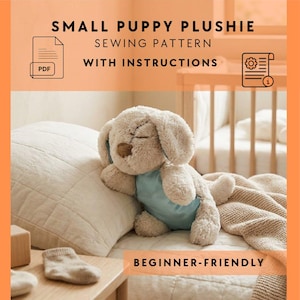 May include: A beige puppy plushie with closed eyes, wearing a light blue outfit, rests on a white pillow. The image includes text that reads "SMALL PUPPY PLUSHIE SEWING PATTERN WITH INSTRUCTIONS" and "BEGINNER-FRIENDLY".