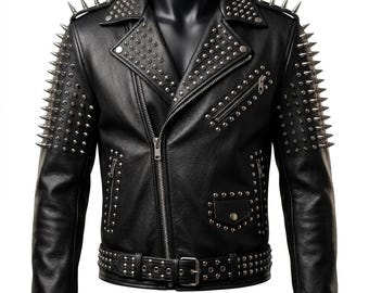 May include: Black leather jacket with silver spikes and studs. The jacket features a notched collar, a zipper closure, and a belt with a buckle. The shoulders and upper arms are adorned with long, pointed spikes.